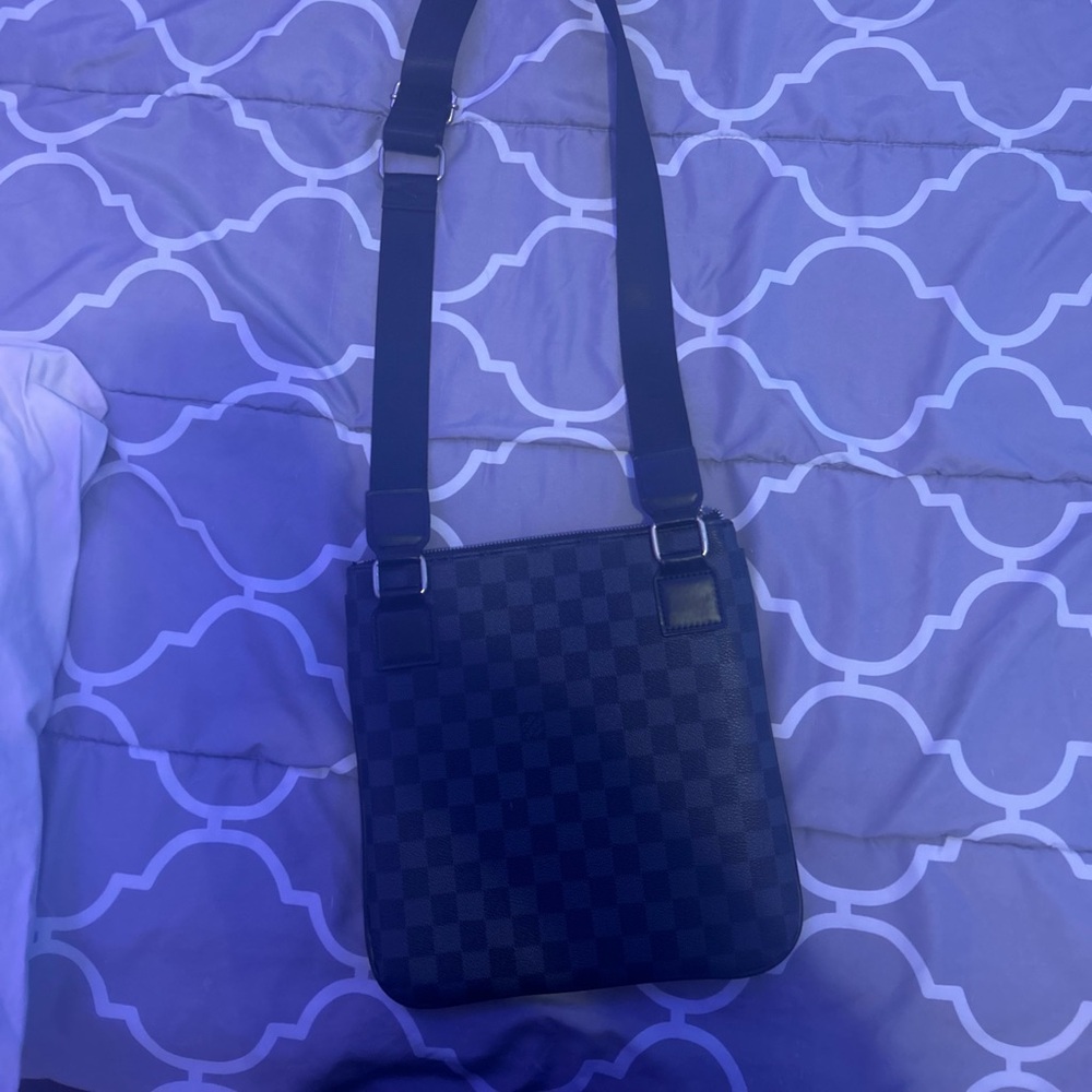 Black Louis Vuitton
Cross body bag